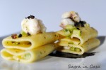Paccheri pasta with a monk fish and zucchini sauce, squid ink and thyme