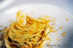 Spaghetti from Gragnano cooked in Amalfi’s lemon zest, fresh squid and Bottarga